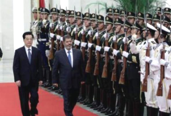 مرسي للرئيس الصيني: أنا وأنت مهندسان فدعنا نتحدث بلغة الإنجازات