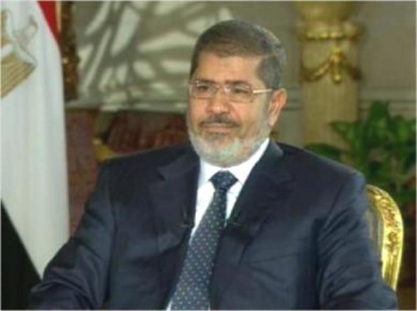 أسامة نجل مرسي يتحدث عن تفاصيل زيارة والده لسجن برج العرب